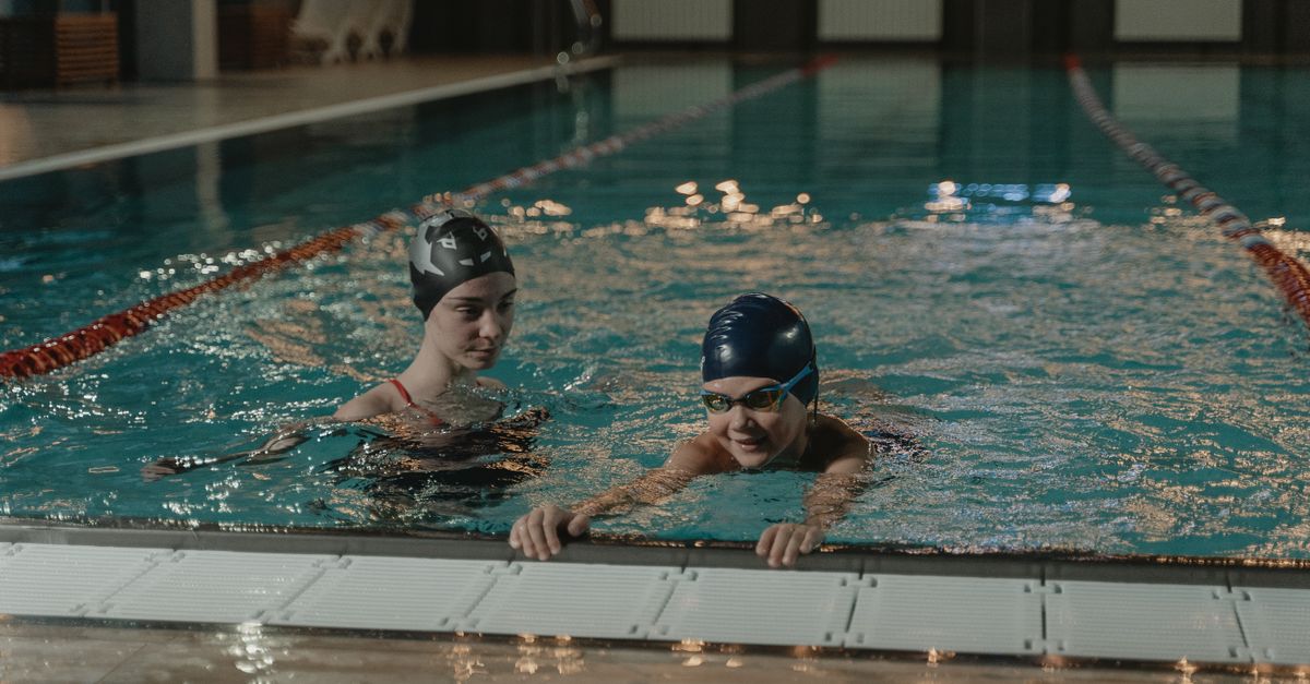 programme d'entraînement de natation pour améliorer votre technique, endurance et performance dans l'eau.